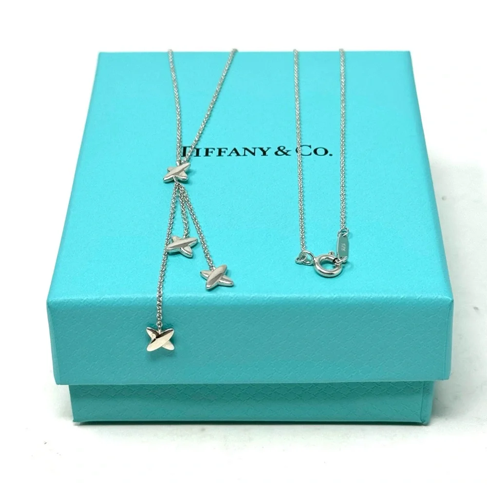 Authentic Tiffany & co. Triple X Kiss Cross Drope Necklace.